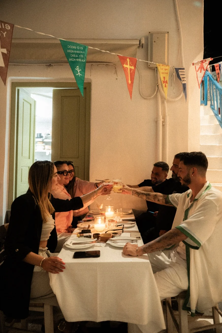 Group birthday celebration at Pūblico restaurant Mykonos — the best group dining venue in Mykonos with sharing menus from €75 per person