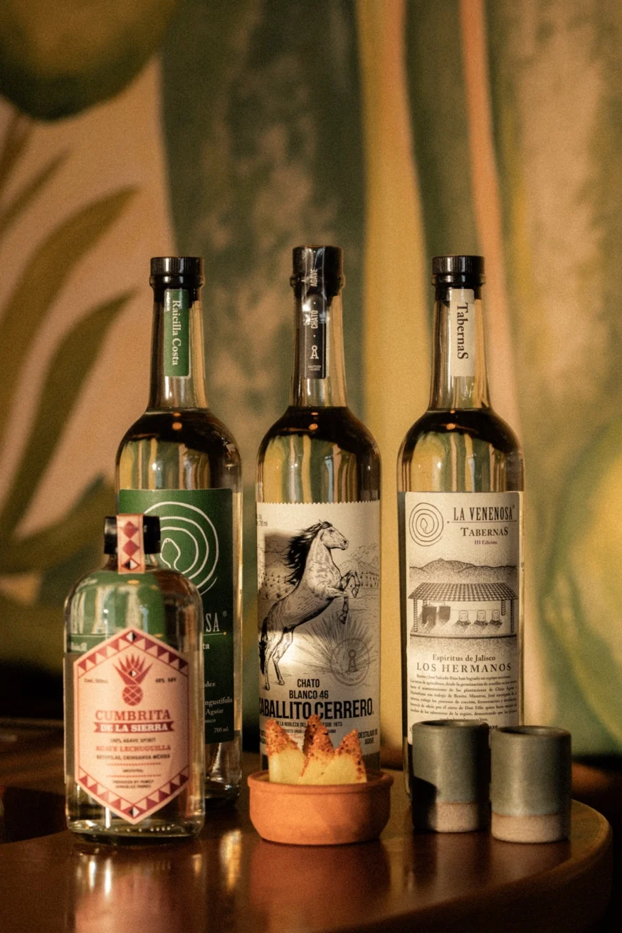 Artisanal mezcal flight selection at Pūblico Mezcalería — rare agave spirits from Mexico, Mykonos