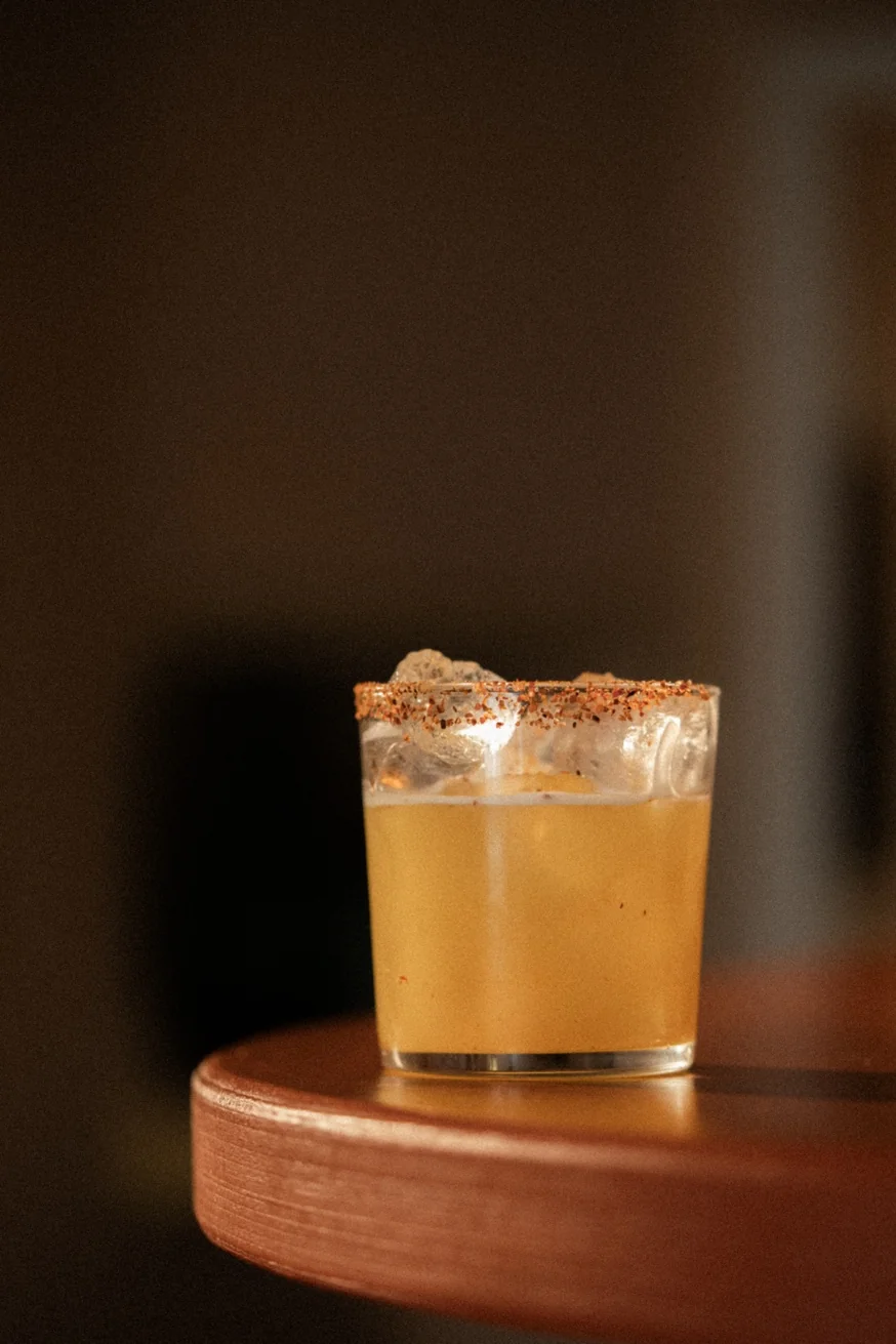 Spiced margarita with chilli rim served on the bar at Pūblico Mezcaleria Mykonos